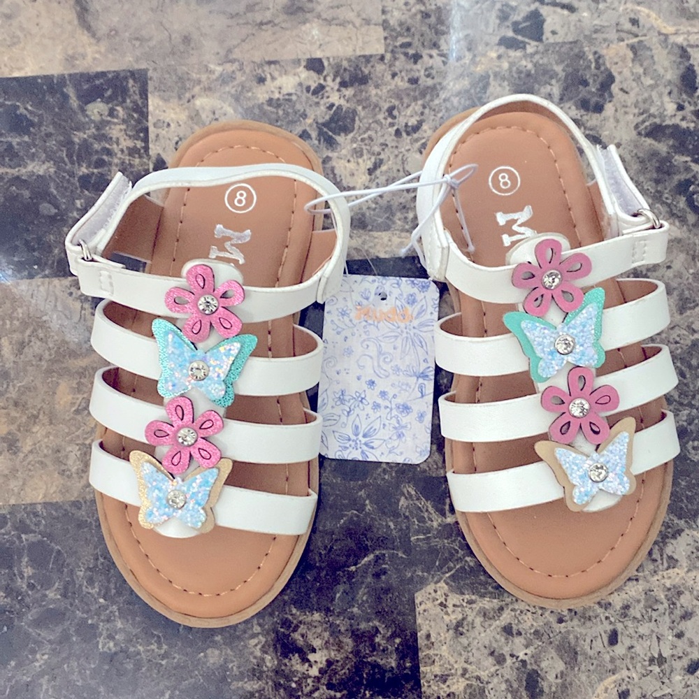 Toddler girls sandals by Mudd. Never worn size 8.
